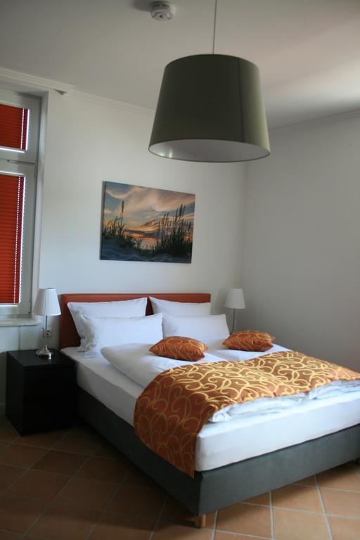 Apartmenthaus Unterwegs Rostock Chambre photo